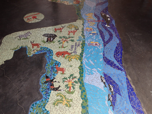 Segment pictures of a mosaic floor map of the St Lucia area.